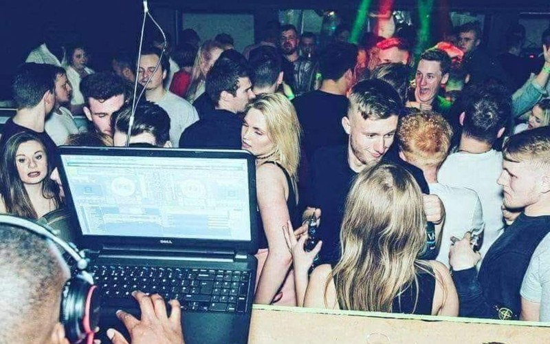 Party crowd energy at a DJ event